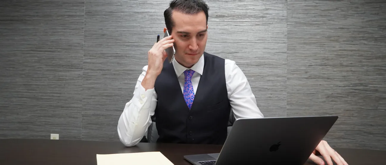 Legal professional reviewing an injury claim for compensation and case value.