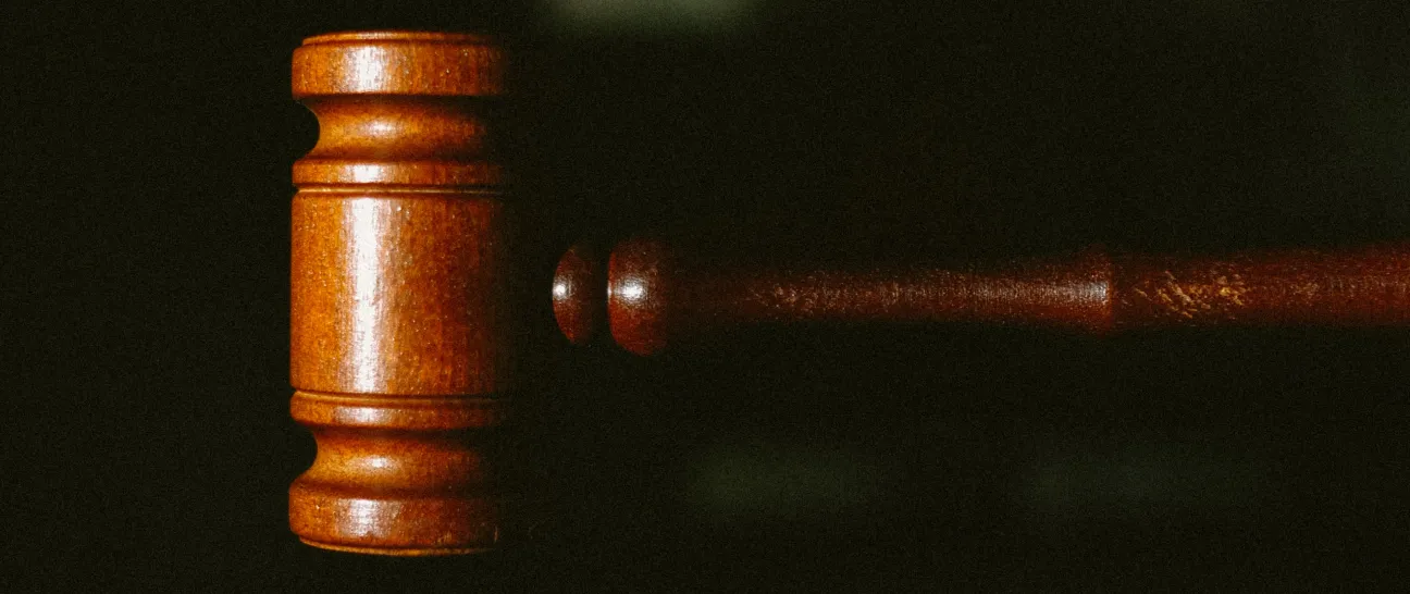Judge’s gavel representing legal action after an insurance dispute.