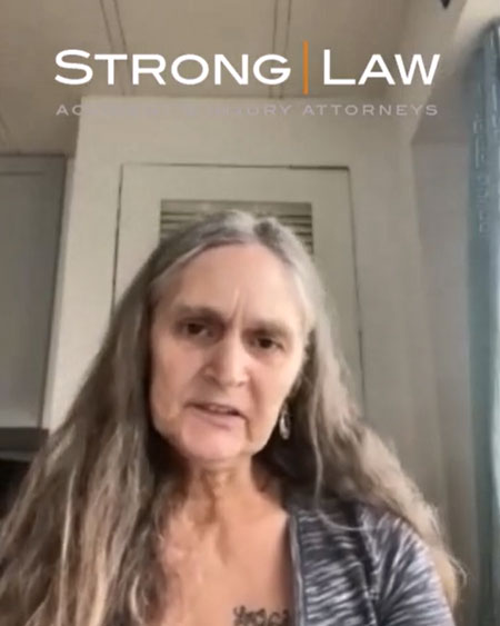 Strong Law client discussing her experience in a video testimonial