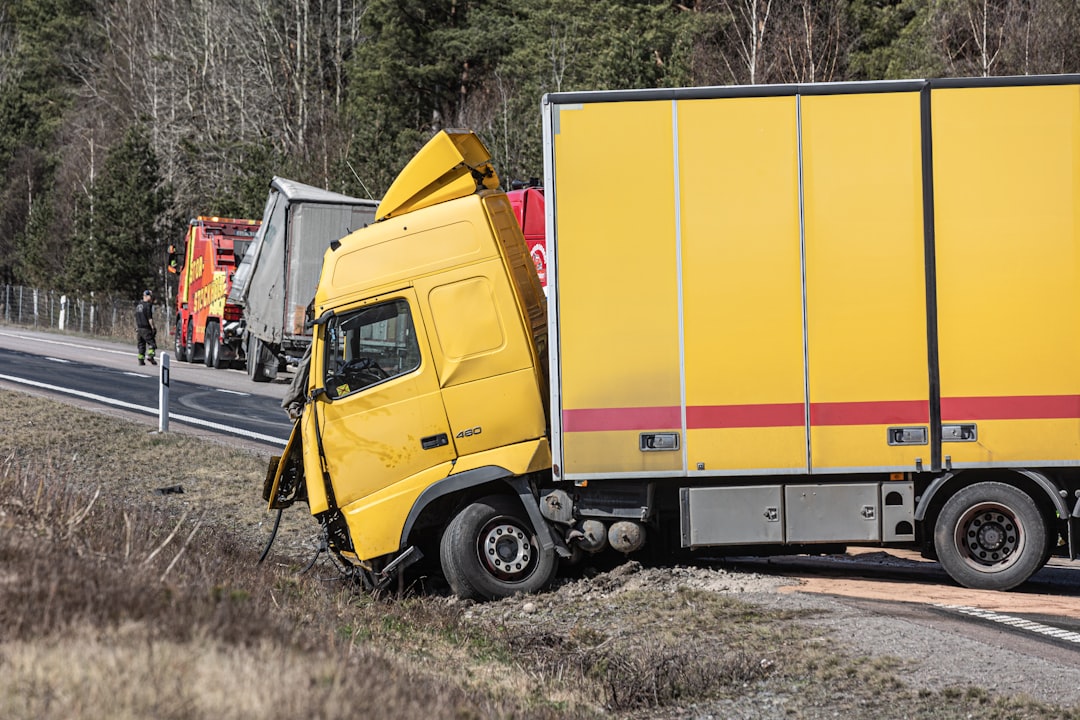 Damaged semi-truck off the roadway after a crash.