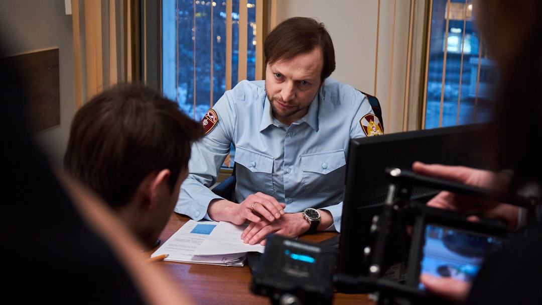 Man reviewing documents and evidence after a crash investigation.