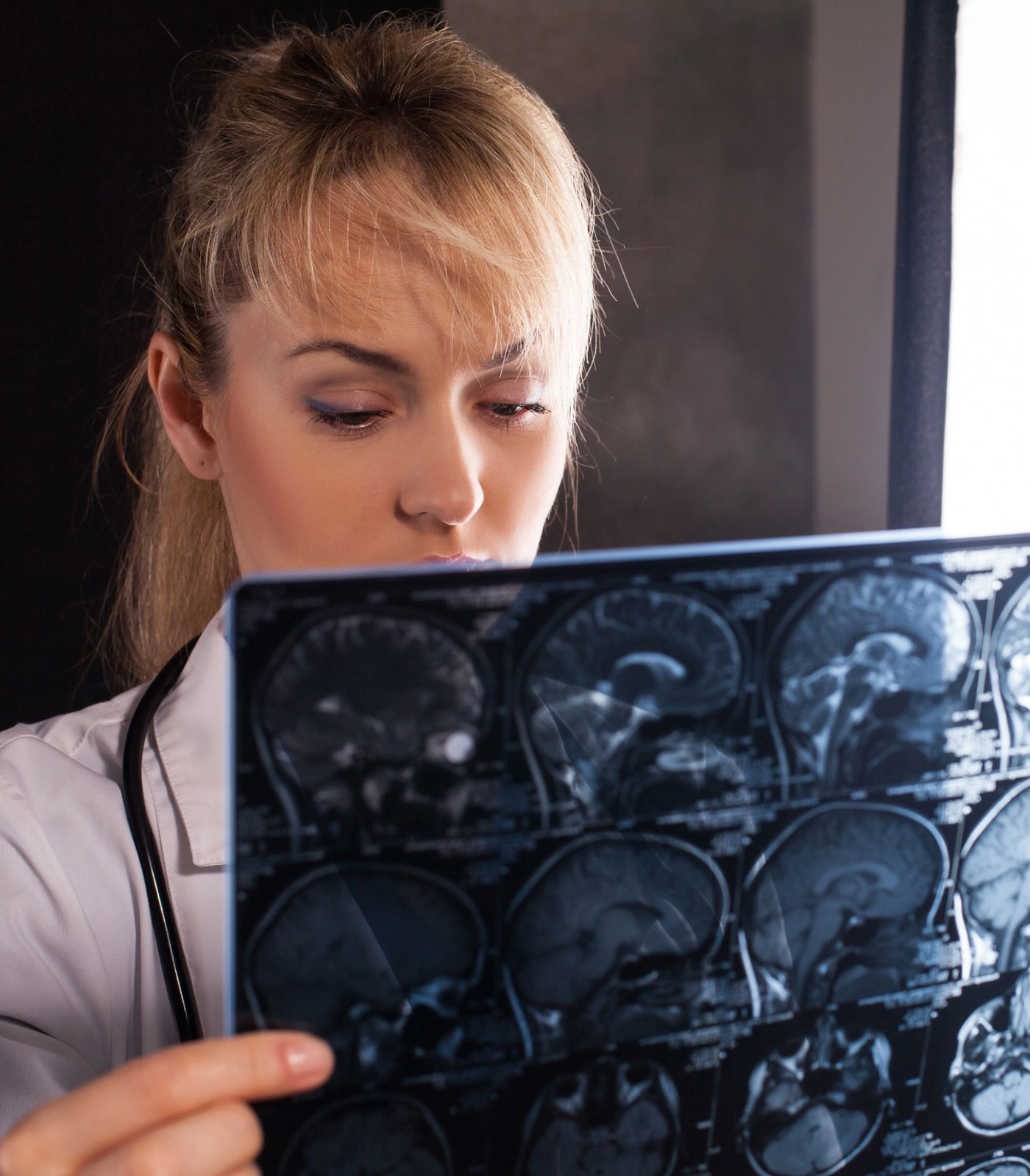 Washington TBI lawyer reviewing medical evidence for a brain injury claim.